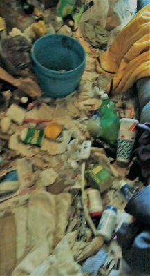 HH-0036B
Photo Date: June 28, 2019
Photo Credit: Nathan Scherer ACHD
Description:  Hoarder house. Used sanitary paper and human fecal in bucket
